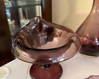 Amethyst dishes with serving pieces and tall vase