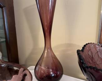 Amethyst dishes with serving pieces and tall vase