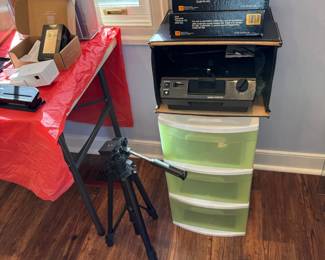 Slide projector and trays; tripod; 3-drawer storage bin