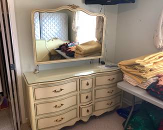 #25	Wood French Provincial  Curved Front  Dresser w/9 Drawers & Glass Protect & Mirror - 60x18x34  Mirror - Mirror - 49x34	 $75.00 

