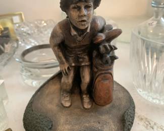 #121	heavy stone golfer guy 9in tall	 $25.00 
