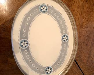 #103	vintage 15x9.5 silver tray with a ceramic gray blue flower tray built in 	 $20.00 
