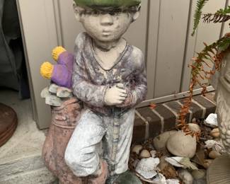 #75	concrete golf man with painted purple bag 23	 $30.00 
