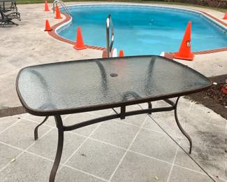 #70	Aluminum Glass Top Patio Table - 60x38x29 - no chairs	 $45.00 
