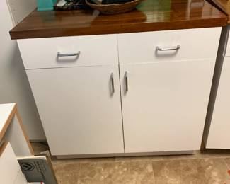 #42	White Laminate Cabinet w/wood top w/2 Doors & 2 Drawers and 1 shelf - 37x25x36	 $75.00 
