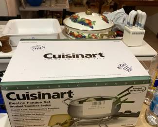#101	Cuisinart electric fondue set stainless in box 	 $20.00 
