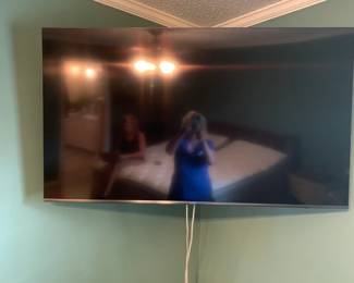 #31	Samsung Mounted TV w/remote - You Remove 55" TV	 $75.00 
