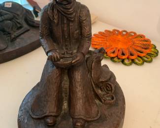 #115	Largo bronze/ceramic  statue of cowboy and statue 	 $40.00 
