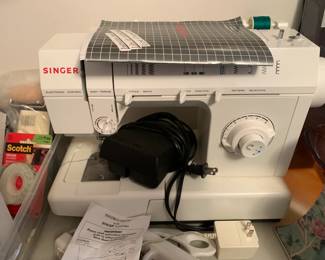 #137	Singer sewing machine 	 $35.00 
