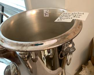 #125	Silver plate Champaign ice bucket 	 $25.00 
