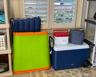 inflatable paddle board and coolers