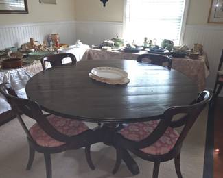 Immaculate Four Hands dining table with 6 upholstered chairs.