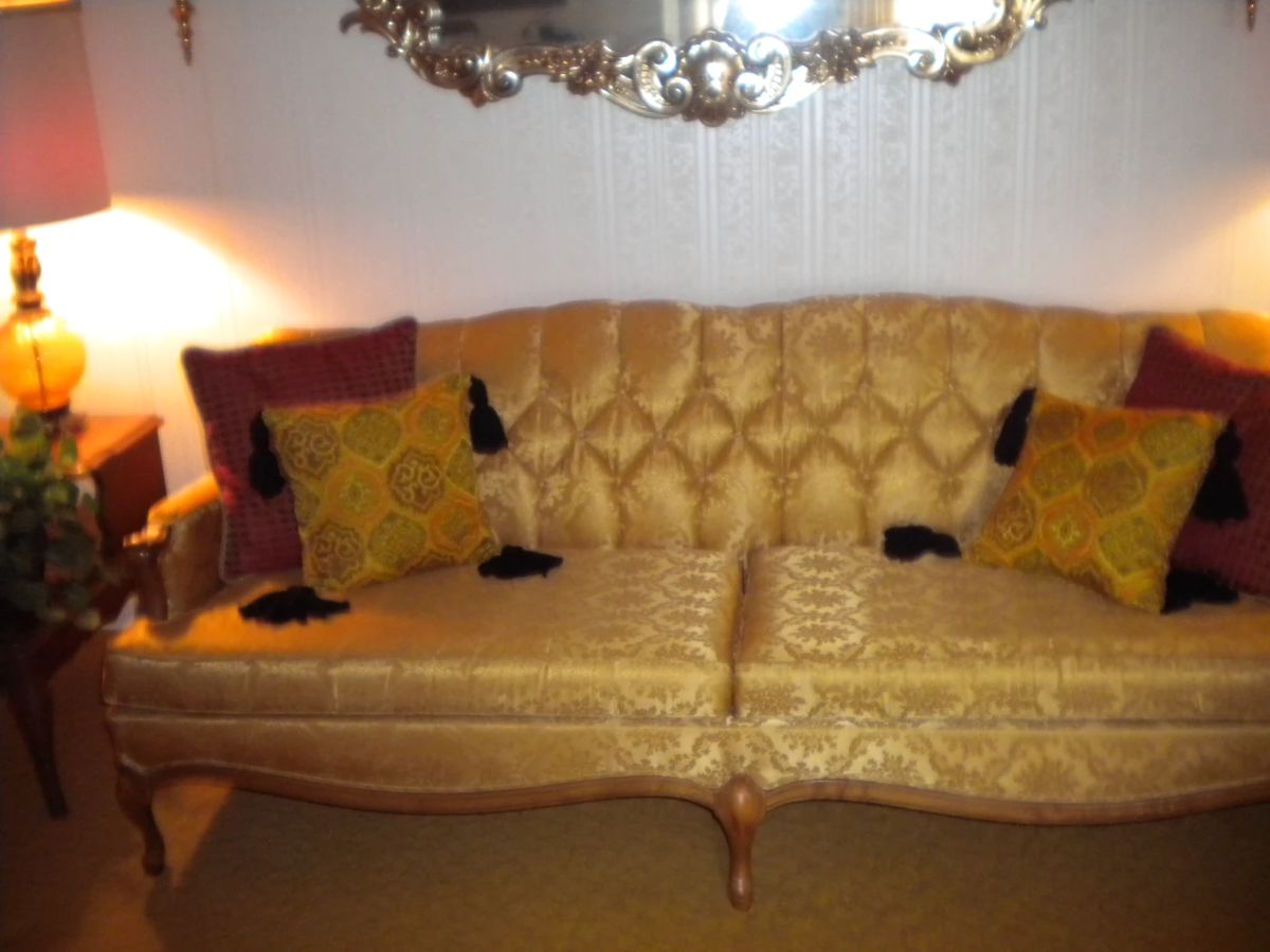 Antique tufted sofa