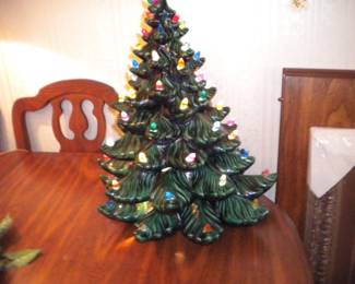 3 tier vintage ceramic Christmas tree missing the base, but lighted