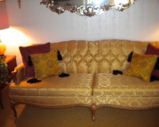 Antique tufted sofa