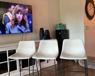 Set of 3 Ashley high back leather chairs, counter height.$140 for all three or $50.00 each. 