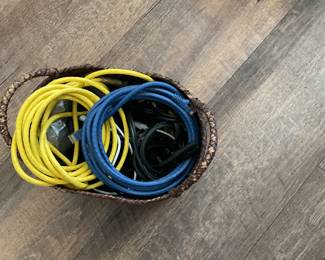 An assortment of HDMI, PHONE CORDS and other cords $20