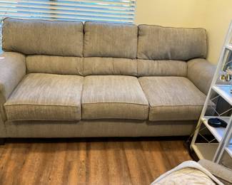 83” grey couch in good condition. Very comfortable.