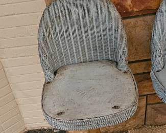 Rattan boat chairs, cast iron bases