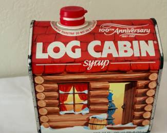 1987 Log Cabin Syrup 100th Anniversary collectible tin.