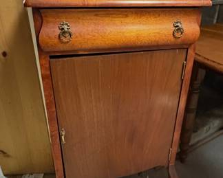antique sheet music cabinet, likely from the early 20th century