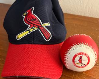 Cardinals hat and baseball 