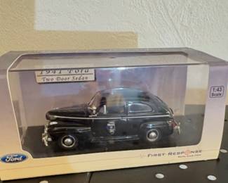 cast model of a 1941 Ford Two Door Sedan, —Pennsylvania RR Police car.