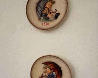 1981 M.l. Hummel Eleventh Annual Collector Plate, titled "Umbrella Boy". And 1982 “Umbrella Girl”