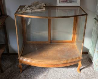 Antique curved glass front display cabinet
