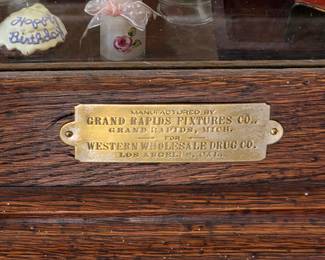Antique cabinet by Grand Rapids Fixtures for Western Wholesale Drug Co. 