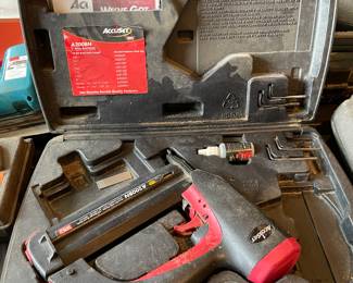Nail gun in its case