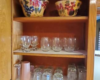Variety of glassware, china, ceramic bowls, serving trays, barware, kitchen utensils, pots, pans, bakeware, sheet pans, cutting boards + tons of kitchen appliances, refridgerator, washing machine, new bosch dryer, vacuums, mops & more