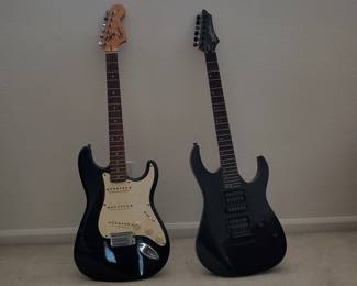 electic guitars - two, need strings, work perfectly