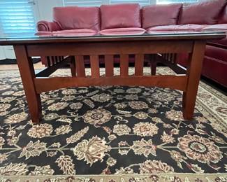 R6 - $125. Ethan Allen Coffee Table with Glass Top. Measures 38" square x 17.25" tall. Solid wood & sturdy! Does show some wear/cosmetic issues on the legs but overall good vintage condition!
