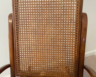 R19 - $50. Vintage Single Caned Rocking Chair. Measures 19.5" x 17" x 40.25" tall. 