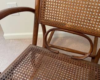 R19 - $50. Vintage Single Caned Rocking Chair. Measures 19.5" x 17" x 40.25" tall. 