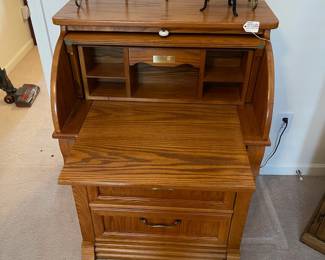R14 - $125. *Small* Childs Size Roll Top Writer's Desk with 3 drawers. Measures 27.5" wide x 19" deep x 25" tall. 