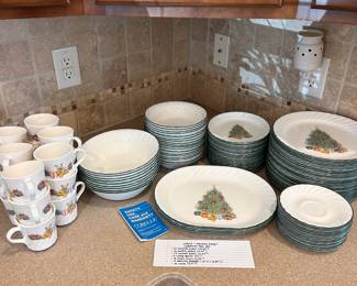 R10 - $225. Corelle by Corning “Holiday Magic” Christmas Tree Dishes
- 32 dinner plates (10.25”)
- 26 salad plates (7.25”)
- 18 saucers (6.25”)
- 9 large bowls (8.5”)
- 18 small bowls (7.25”)
- 4 serving platters (10”w x 12.25”l)
- 18 cups (3.5”t)