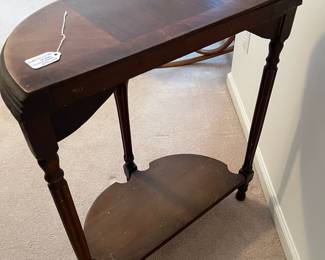 R16 - $30. Antique Demilune Table. Measures 23.5" x 12" deep x 28.75" tall. In good antique condition. 