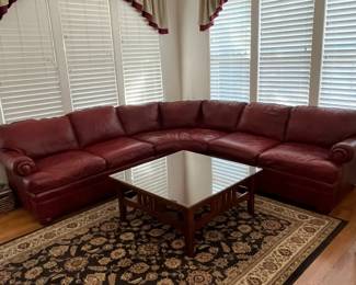 R7 - $425. Ethan Allen 3 Piece Leather Sectional. Measures 109" x 106". Does show wear on the leather but it's sturdy and no rips/holes etc. 