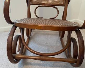 R19 - $50. Vintage Single Caned Rocking Chair. Measures 19.5" x 17" x 40.25" tall. 