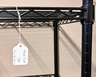 R37 - $25. Metal Shelf Unit. Measures 24" wide x 18" deep x 55" tall. Shelves can be adjusted. No issues/rust noted. 