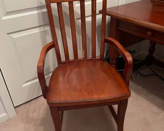 R3 - $25. Single Wooden Arm Chair. Measures 22.75" wide x 17.75" deep x 39.25" tall. Has rubbing from seat cushion on one back spindle. 