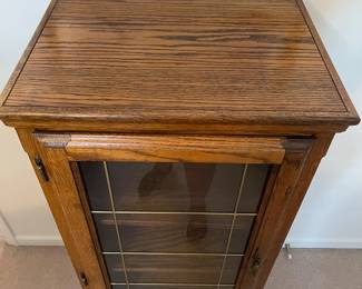 R15 - $40. Small Storage Cabinet with 3 Adjustable Shelves inside. Measures 22" x 16.5" x 50" tall. 