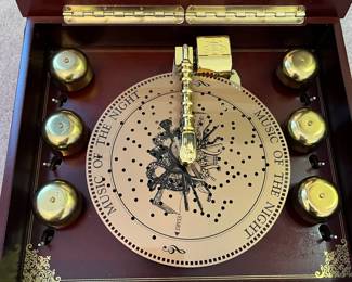 R63 - $55. Mr. Christmas Music Box with 32 "Records".  Includes power cord & works!
