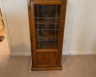 R15 - $40. Small Storage Cabinet with 3 Adjustable Shelves inside. Measures 22" x 16.5" x 50" tall. 