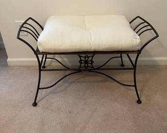 R17 - $30. Wrought Iron Bench with Cushion. Measures 33" wide x 14" deep x 19" tall. 