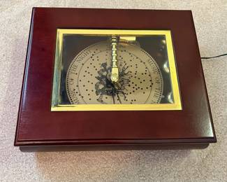 R63 - $55. Mr. Christmas Music Box with 32 "Records".  Includes power cord & works!