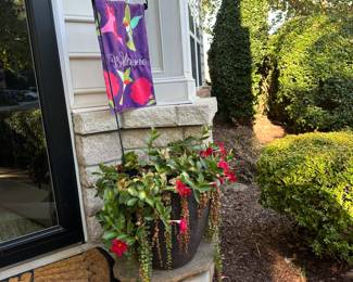 $15. Plastic Planter with Flag & Holder (you must take the dirt & flowers). 16" wide x 14" tall. 