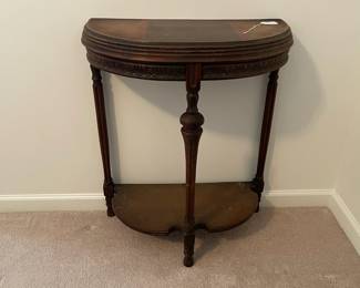 R16 - $30. Antique Demilune Table. Measures 23.5" x 12" deep x 28.75" tall. In good antique condition. 